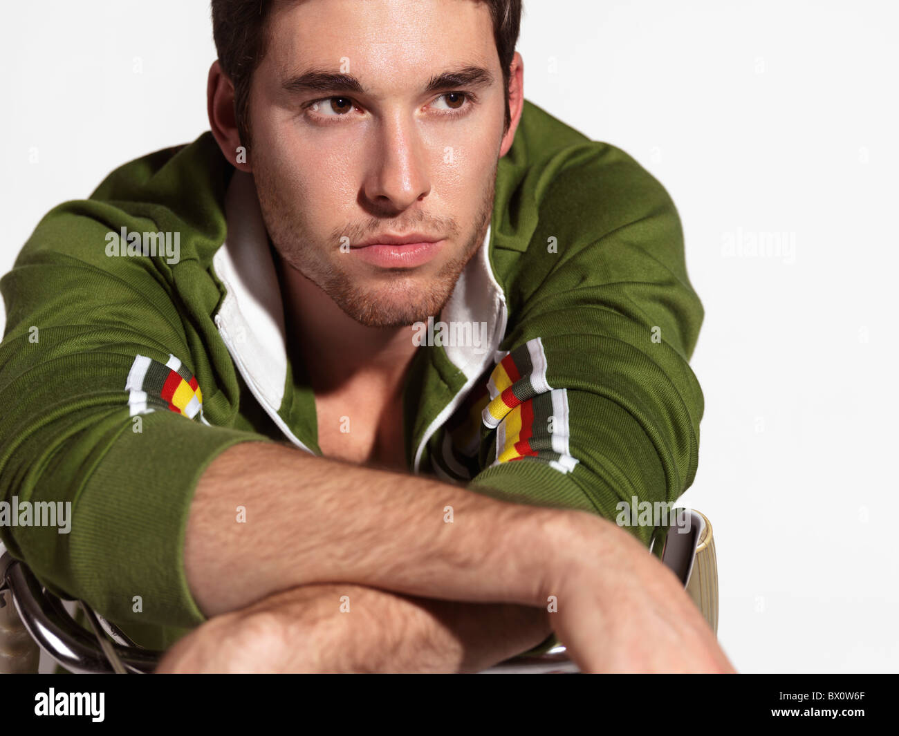 Portrait of a young man on exercise bicycle Stock Photo