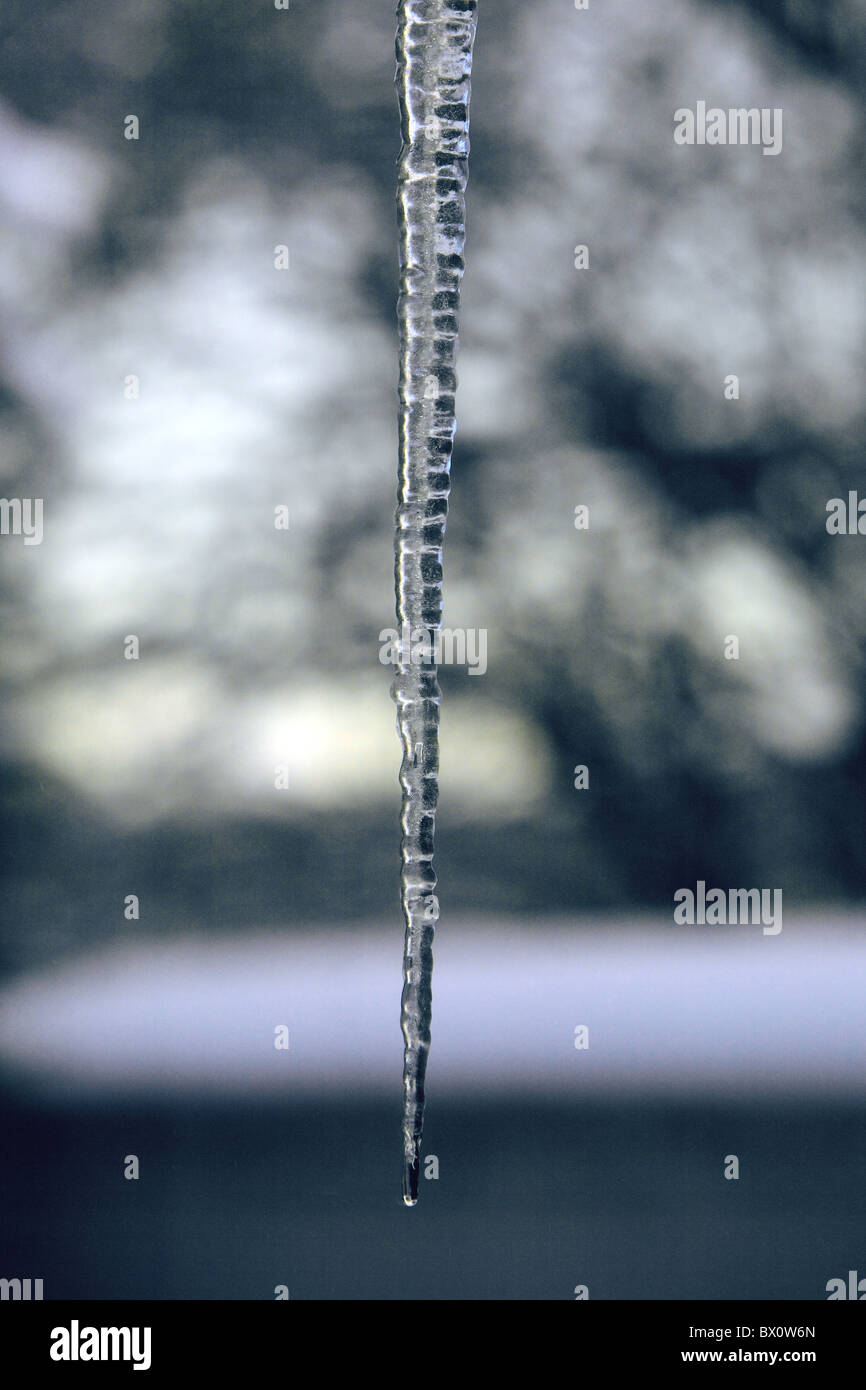 icicle hanging from roof Stock Photo