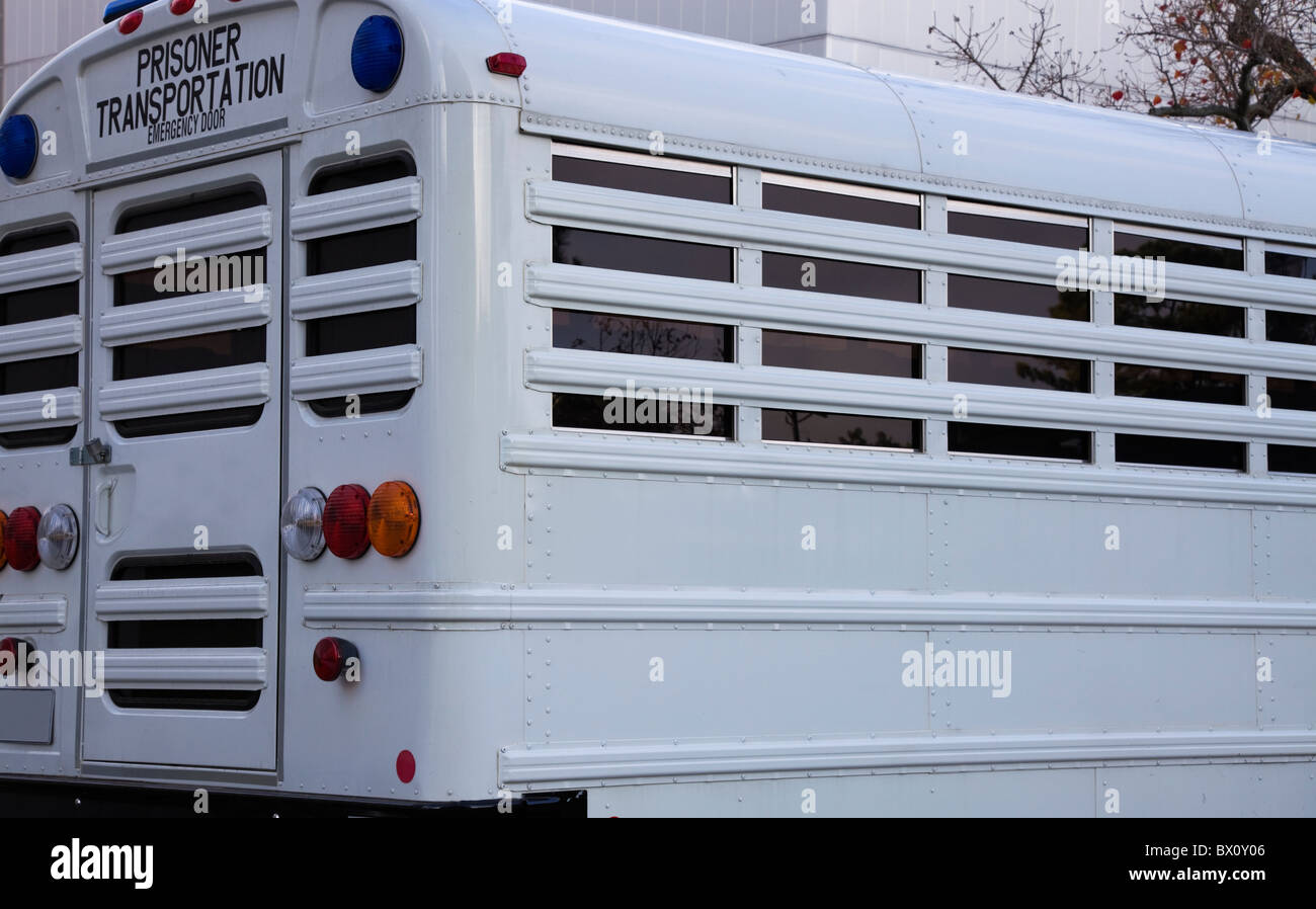 Prisoner Transportation - White Bus Stock Photo