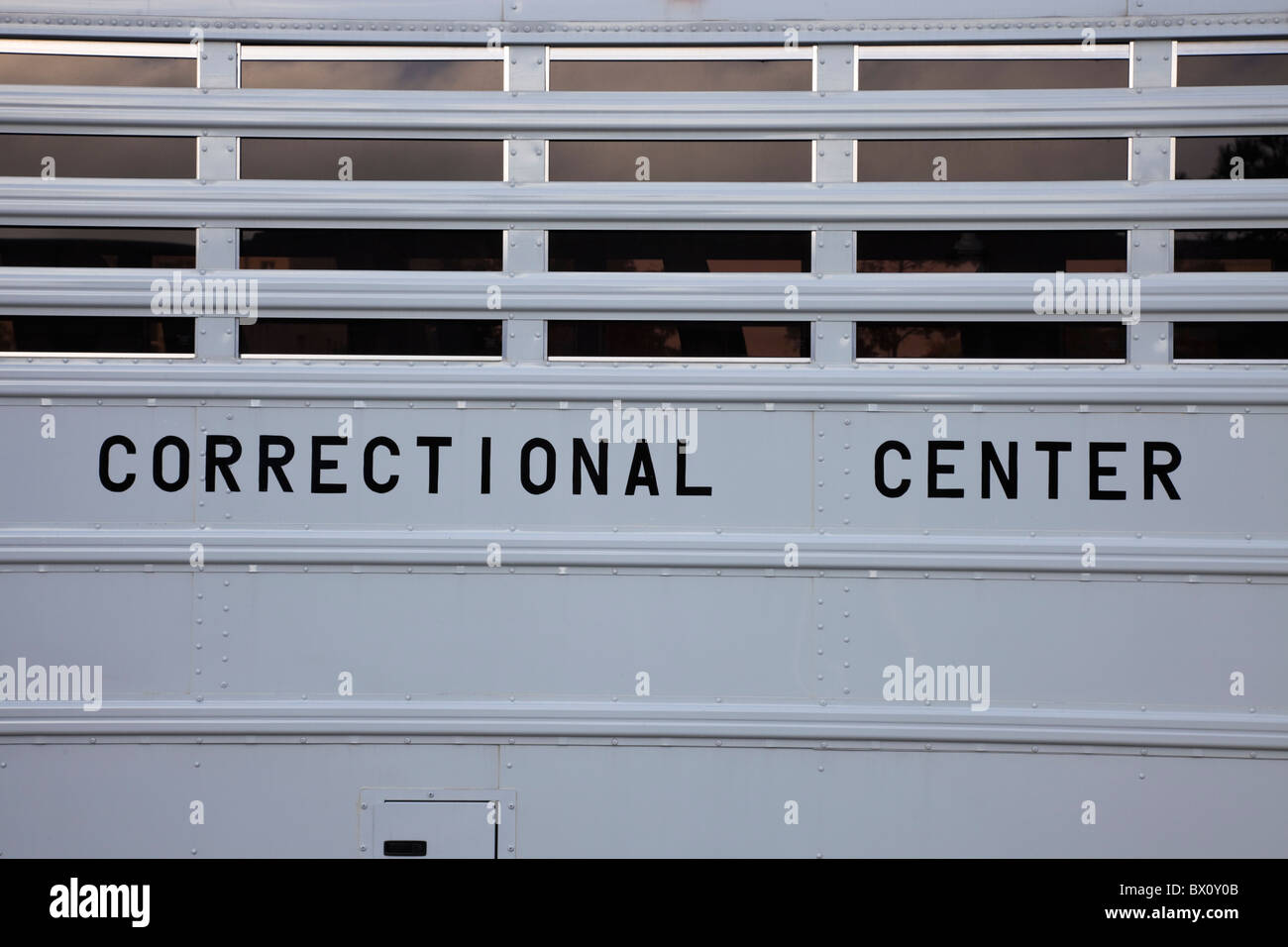Correctional Center - White Secure Bus Stock Photo