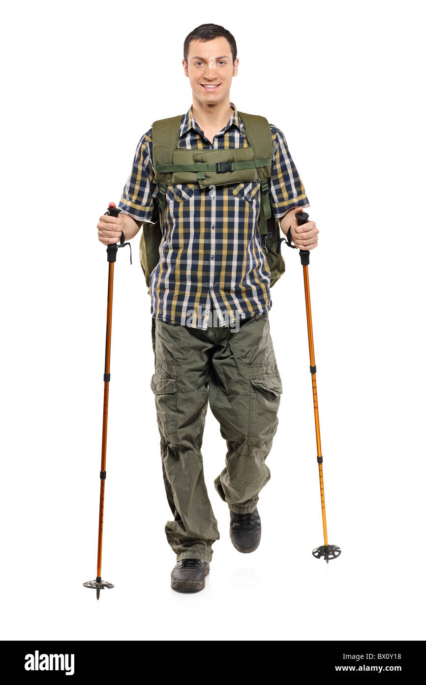 A man in sportswear with backpack and hiking poles Stock Photo