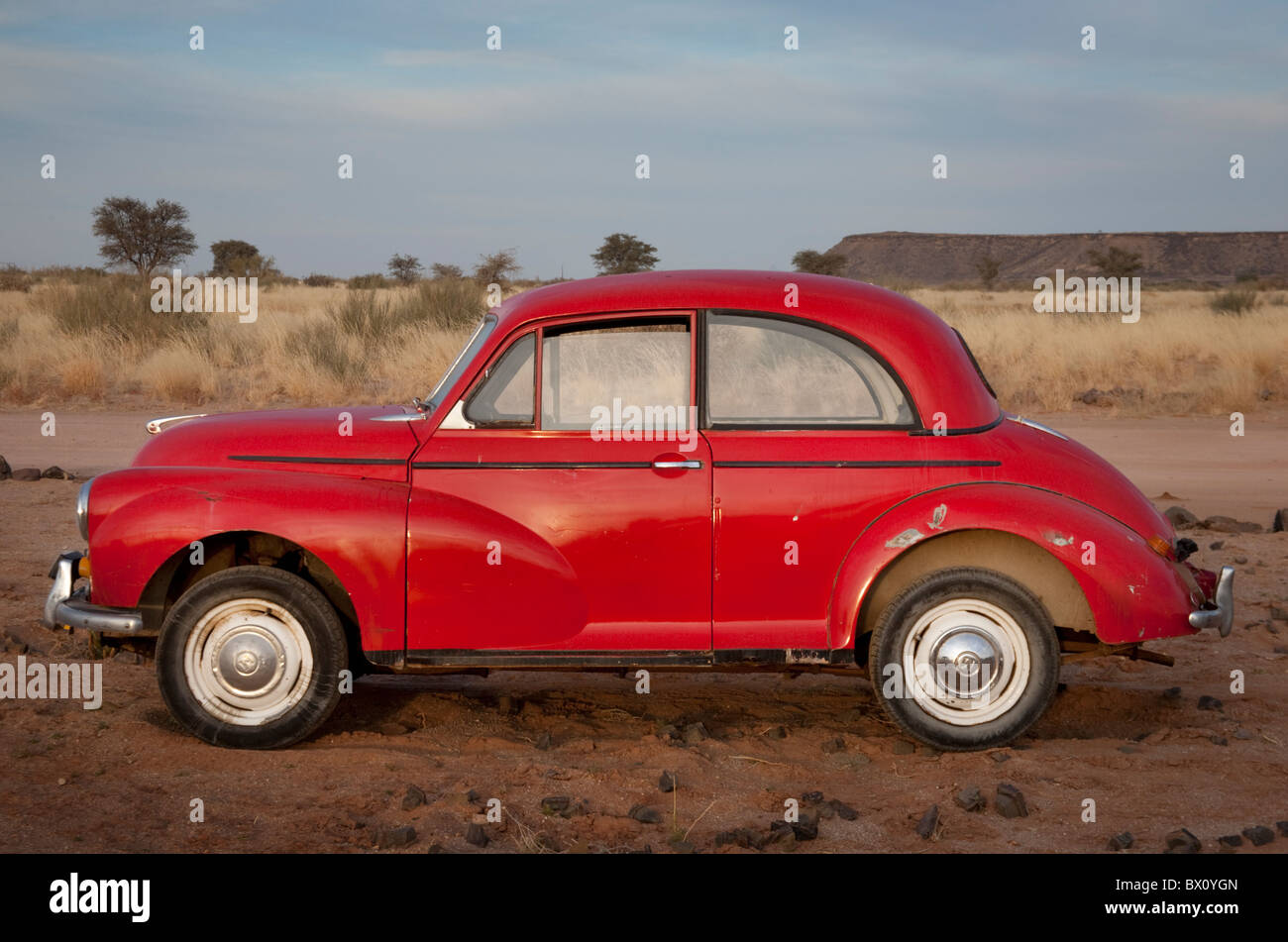 Red Morris Minor 1000 in the desert, Namibia Stock Photo - Alamy