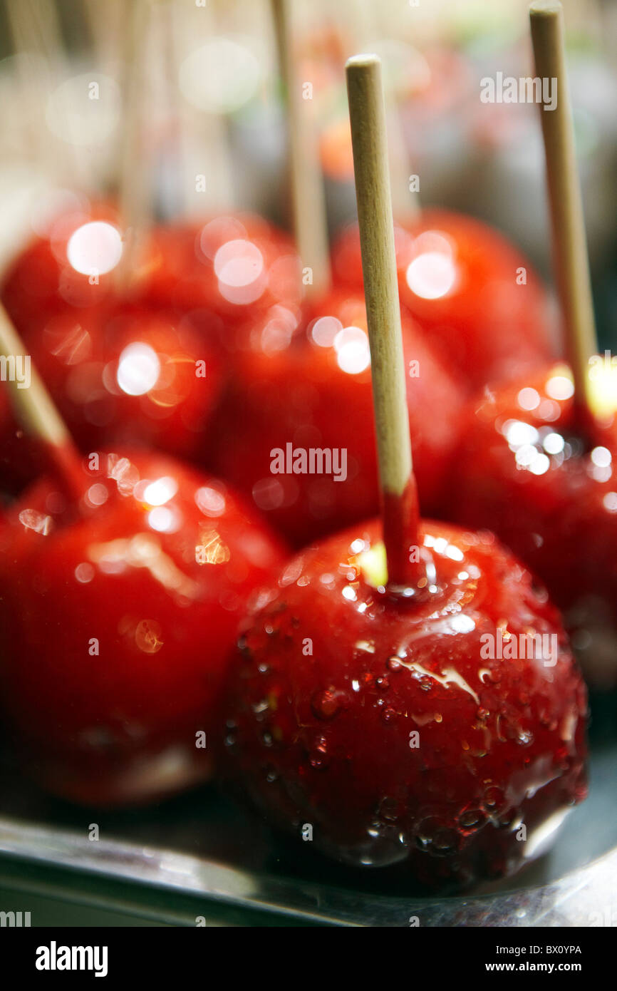 red toffee apples on sticks, Christmas market Stock Photo Alamy