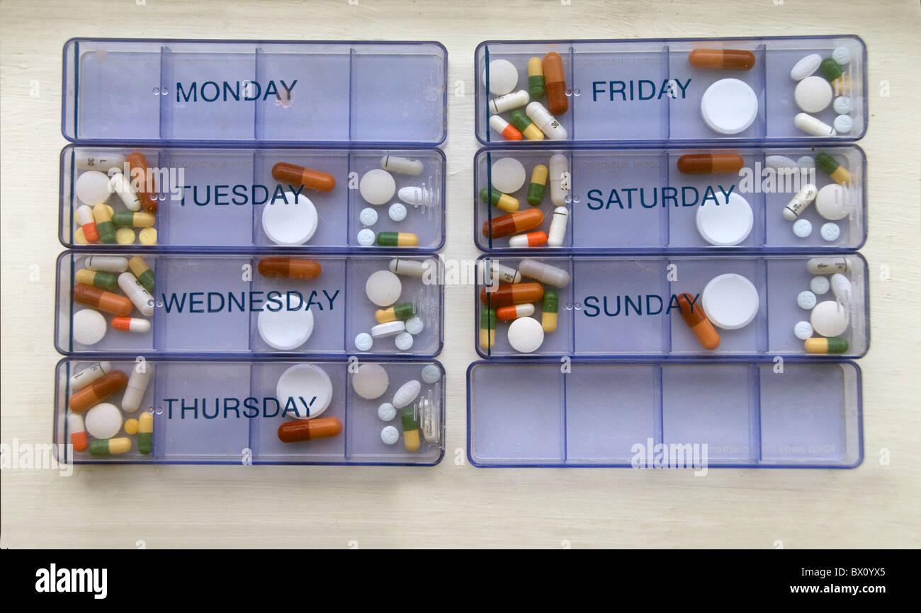 Daily pill dispenser Stock Photo