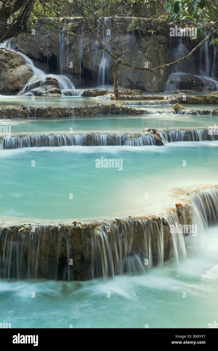 Pool and waterfall in the Tat Kuang Si waterfall system near Luang Prabang in Laos Stock Photo