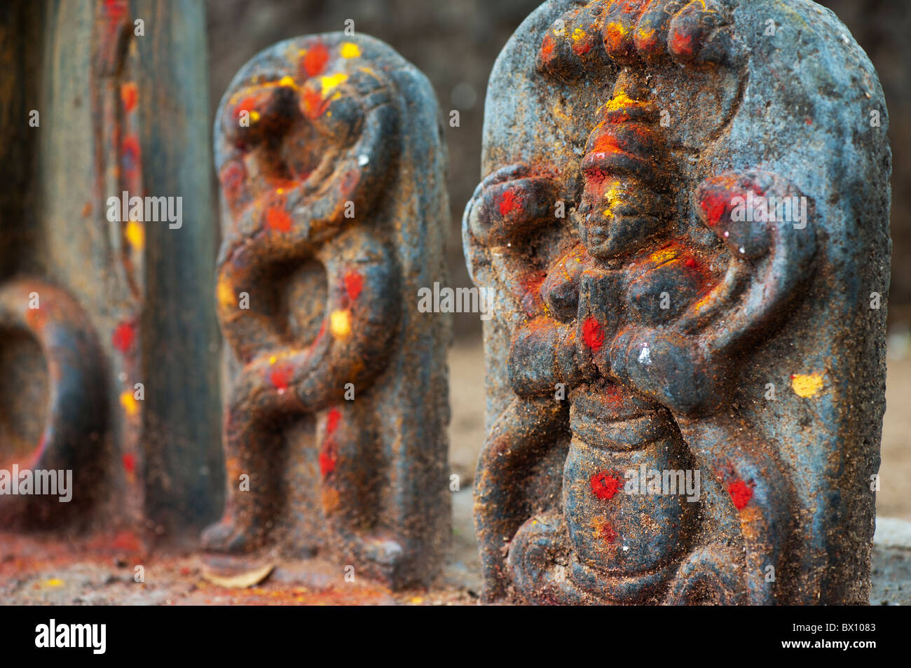Hindu altar stones at a temple depicting Indian vishnu deity in the south indian countryside. Andhra Pradesh, India. Stock Photo