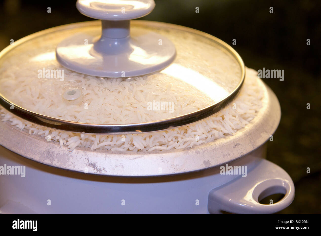 Rice cooker overflowing Stock Photo Alamy