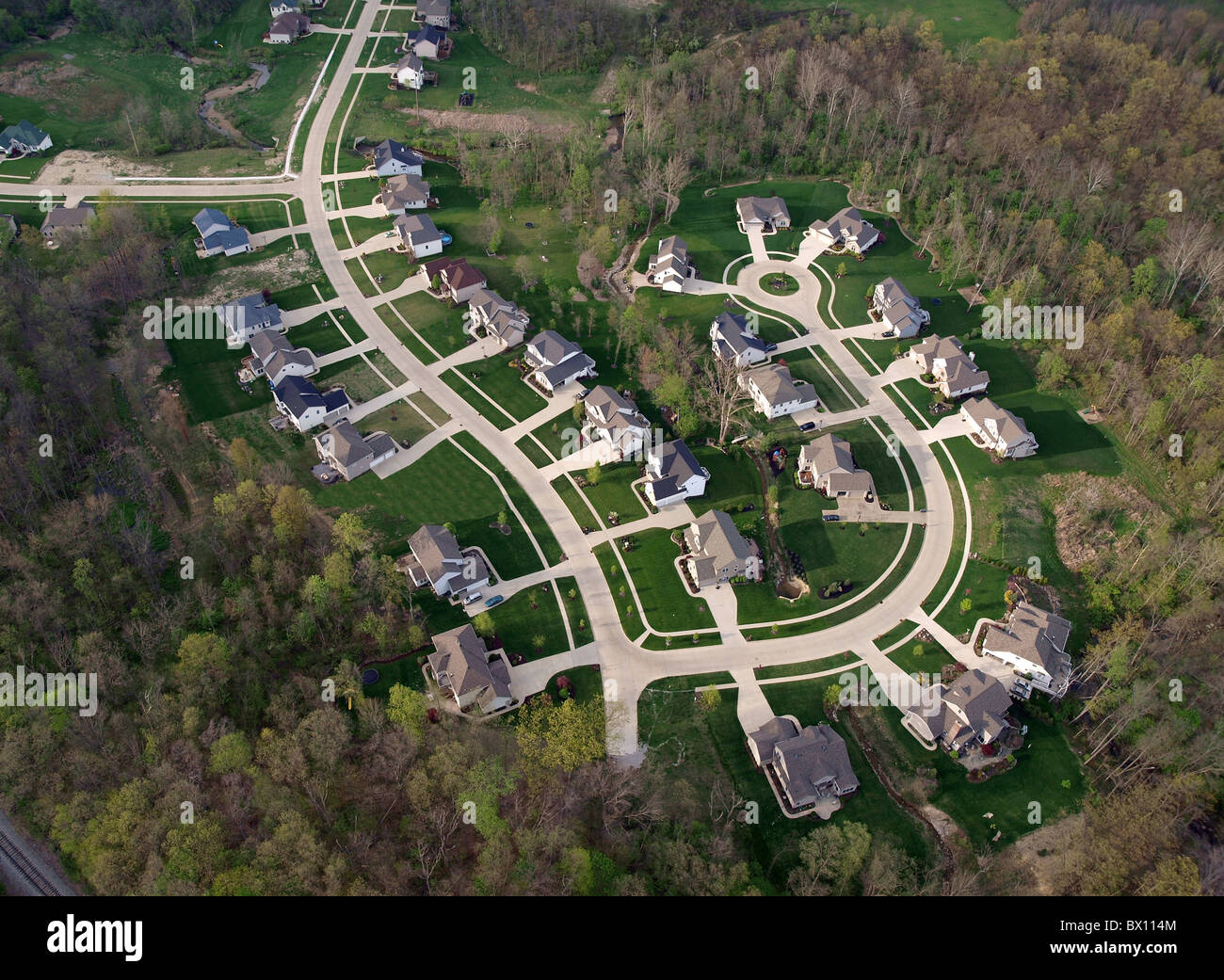 Brand new suburb freshly cut out of a eastern US forest. Stock Photo
