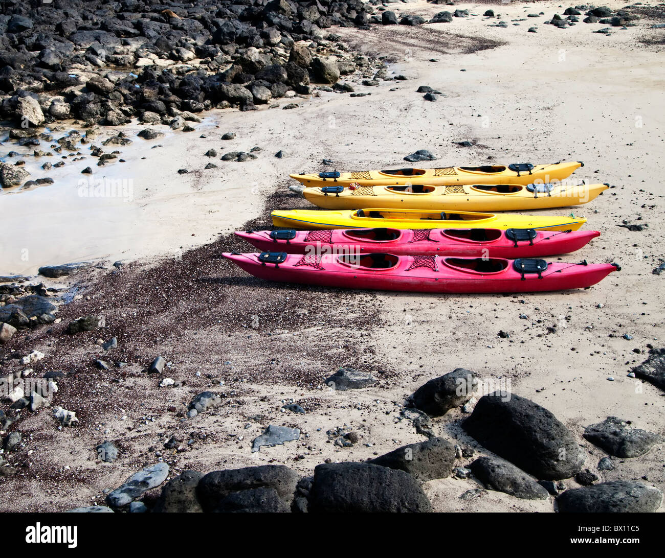 Five Kayaks On The Beach Stock Photo - Alamy