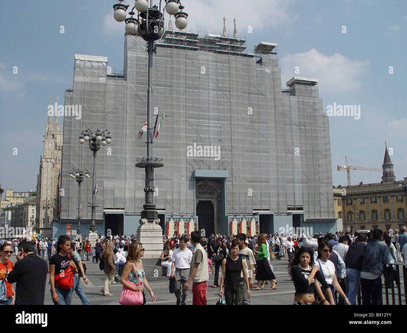 cathedral covers Duomo Italy Europe Milan no model release passerby pedestrian person place scaffold Stock Photo