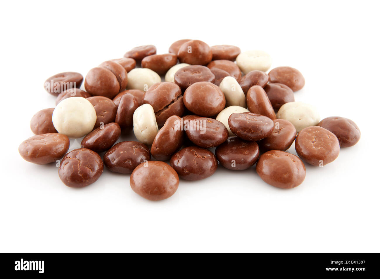 pile of chocolate gingernuts, pepernoten, in closeup. Tyical Dutch candy for 5 december. Stock Photo