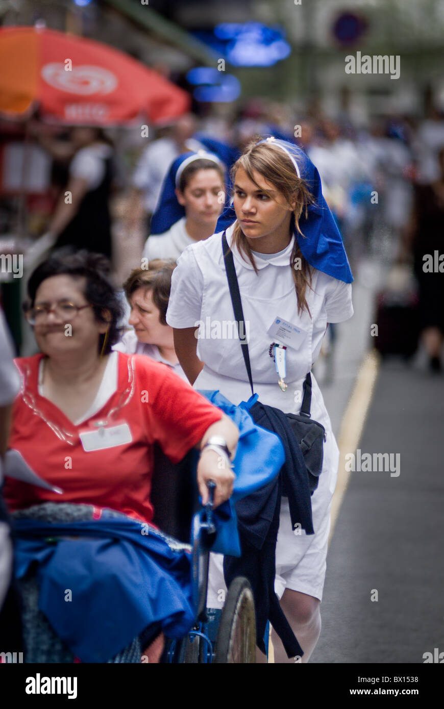 Volunteer helper lourdes hires stock photography and images Alamy