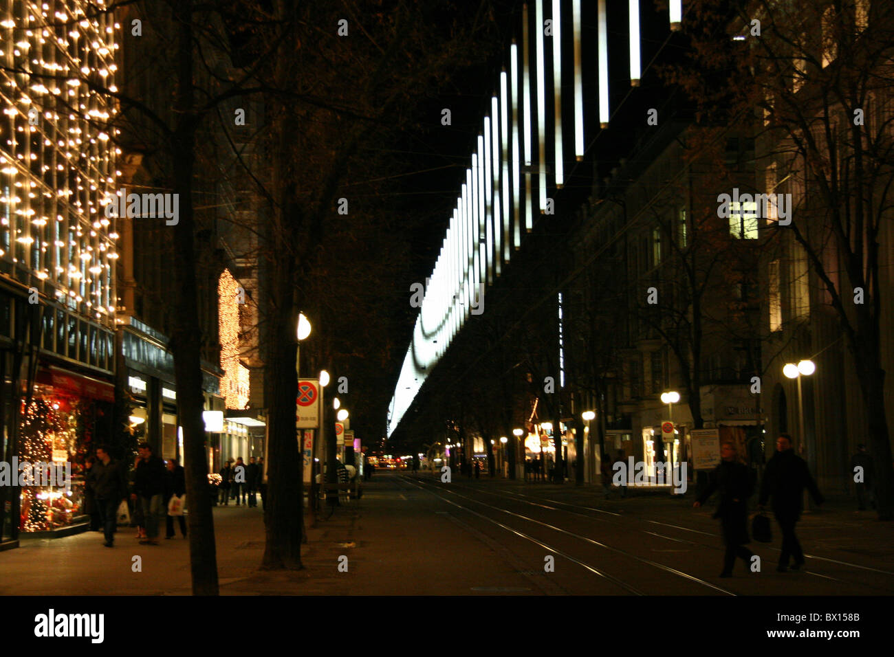 Zurich town city Christmas Bahnhofstrasse at night night business trades stores shopping person lighting Stock Photo