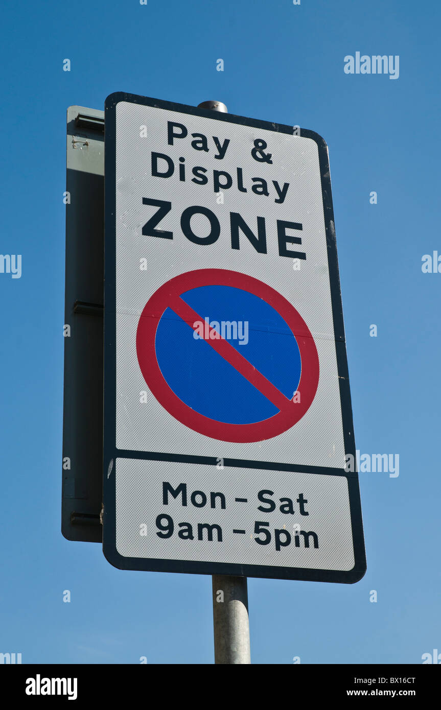 dh  ROADSIGNS UK Pay and Display zone signpost traffic parking restrictions sign uk britain Stock Photo