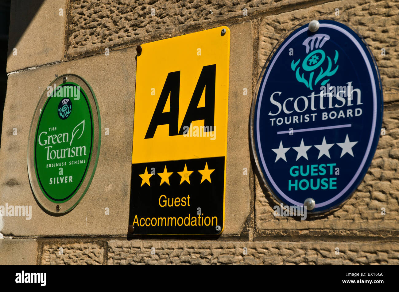 dh Guest House AA four star TOURISM SCOTLAND Plaque Scottish Tourist Board Green plate 4 stars hotel sign signs Stock Photo