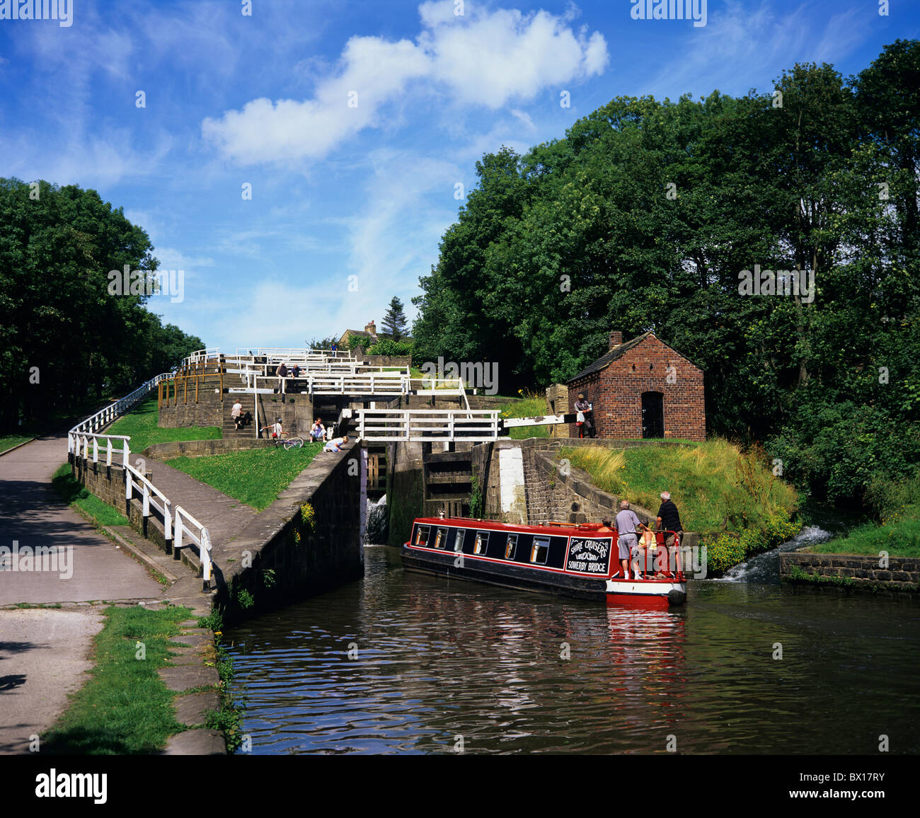 canal barge entering bingley five rise locks on the Leeds Liverpool