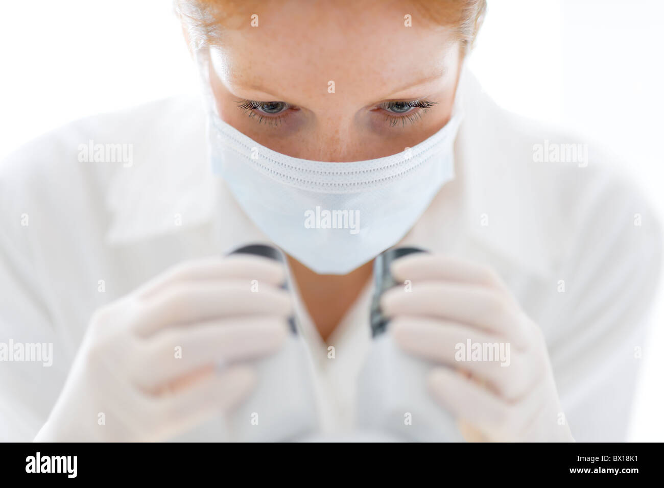 Microscope laboratory - woman medical research chemist experiment, shallow depth-of-field Stock Photo