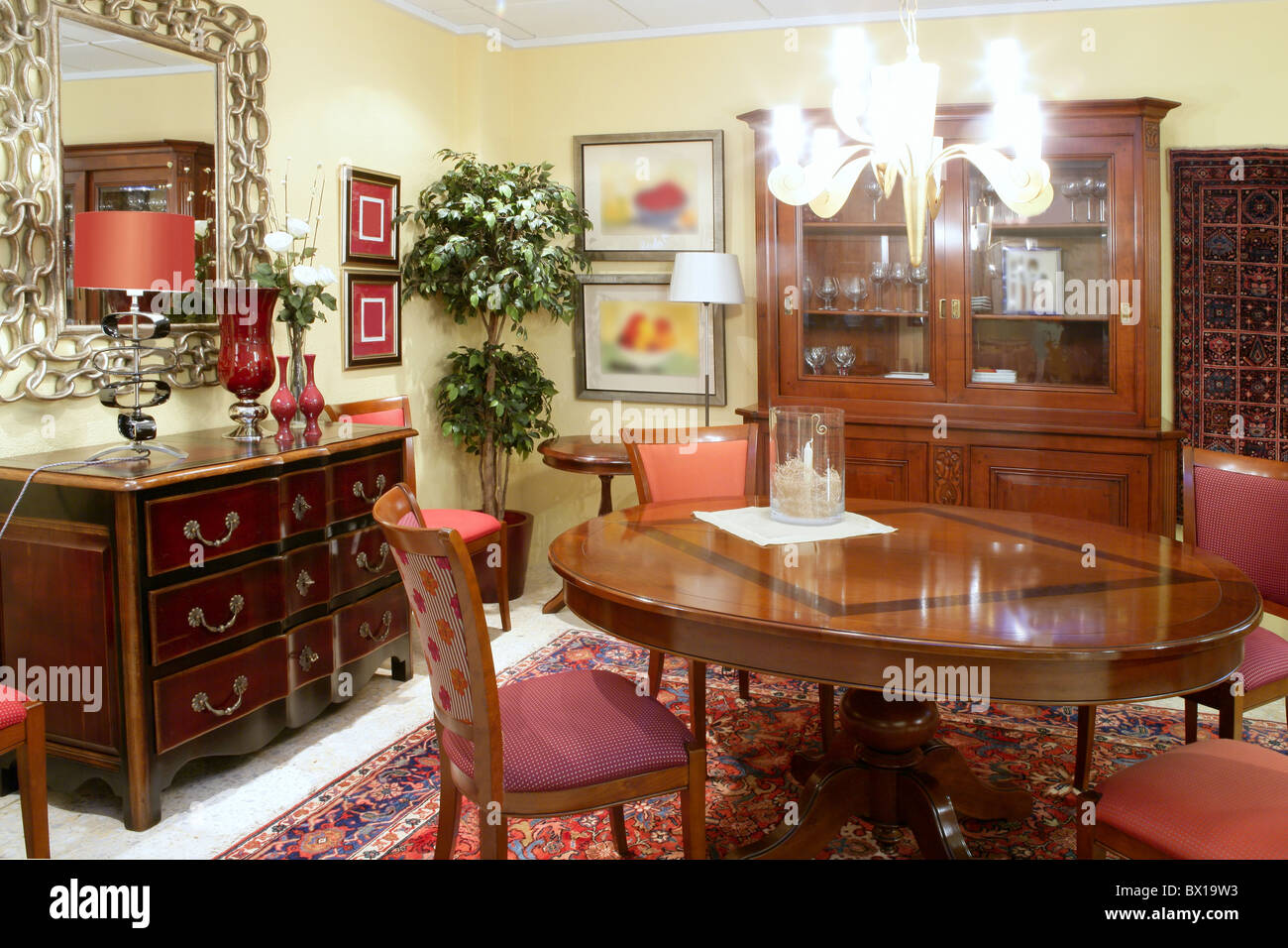 Classic living room table warm wood furniture glowing chandelier Stock ...
