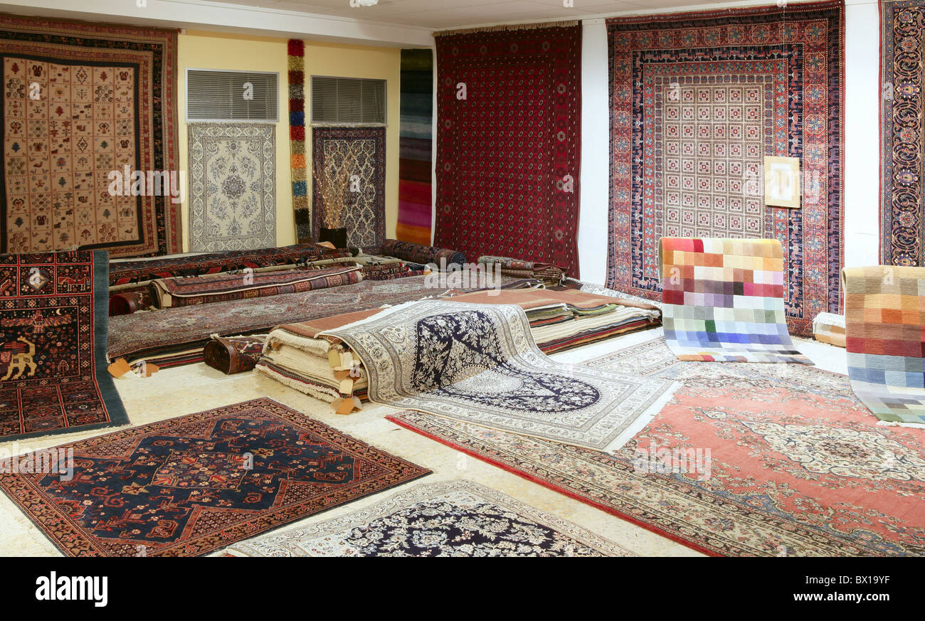 Arabic carpet shop exhibition colorful carpets exposition room Stock Photo