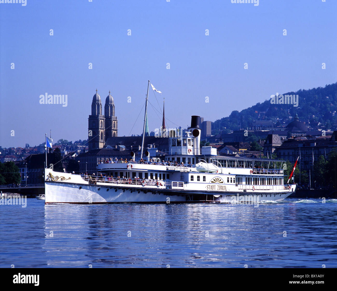 church city excursion Grossmunster minster church lake lakes ship Steamboat summer Switzerland Europe t Stock Photo