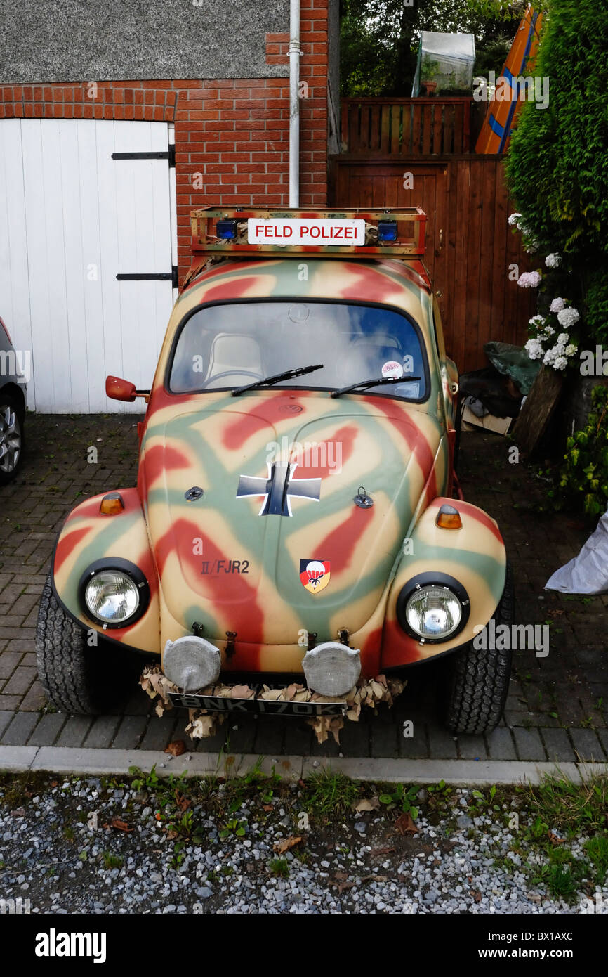 Customised VW Volkswagon Beetle car in camoflauge with words Feld Polizei, Wales. Stock Photo