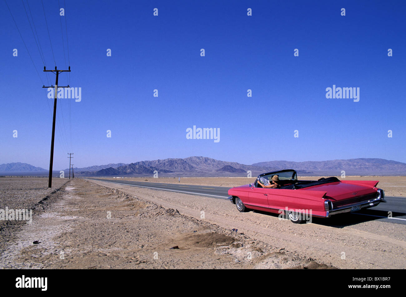 Caddy Road Mojave Desert California USA America United States North America car street cabriolet Stock Photo