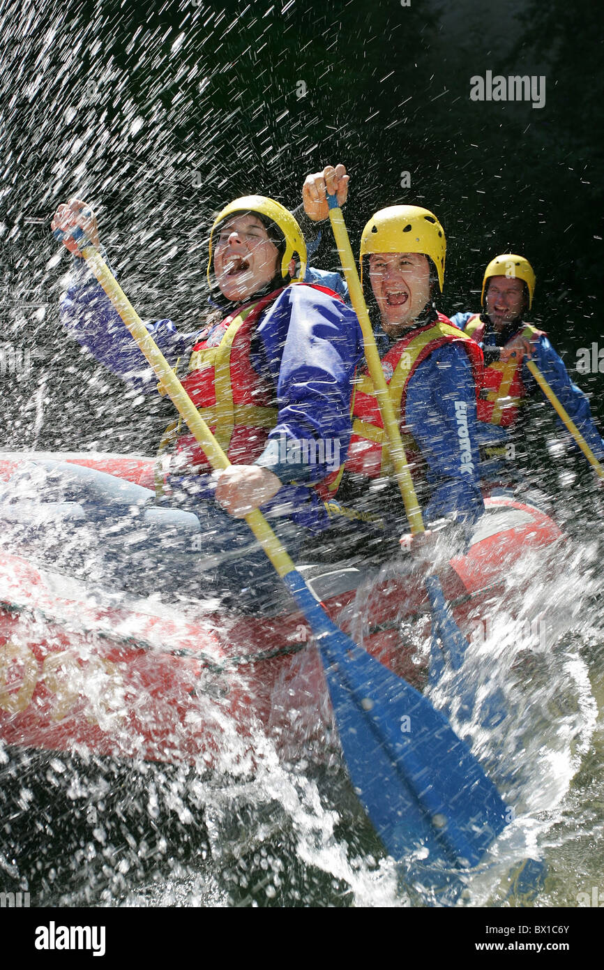 Water sport Rafting rafting Boat rubber dinghy life raft action group splash fun joke sports spare time p Stock Photo