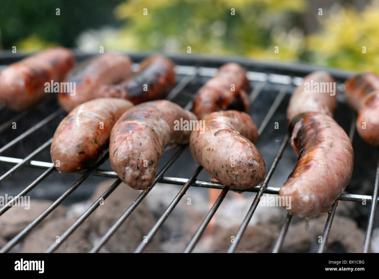 Sausages on the Barbecue in the garden Stock Photo