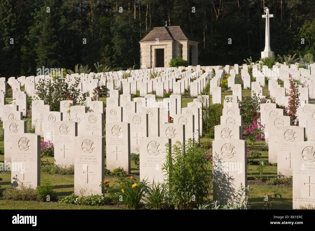 War graves with stone cross Stock Photo