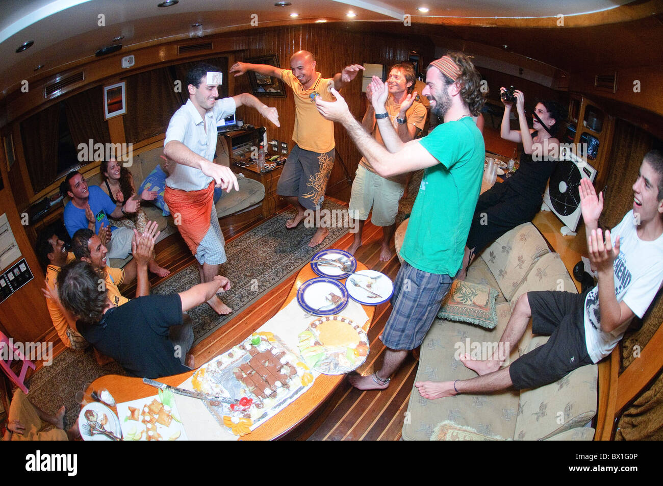 Egypt, Sinai, Red Sea Diving Safari Interior of the diving vessel the mess  hall spontaneous party Stock Photo - Alamy