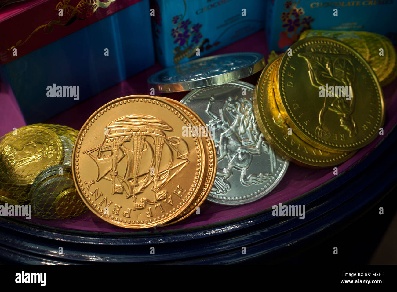 Gold and silver chocolate foil wrapped coins money Stock Photo Alamy