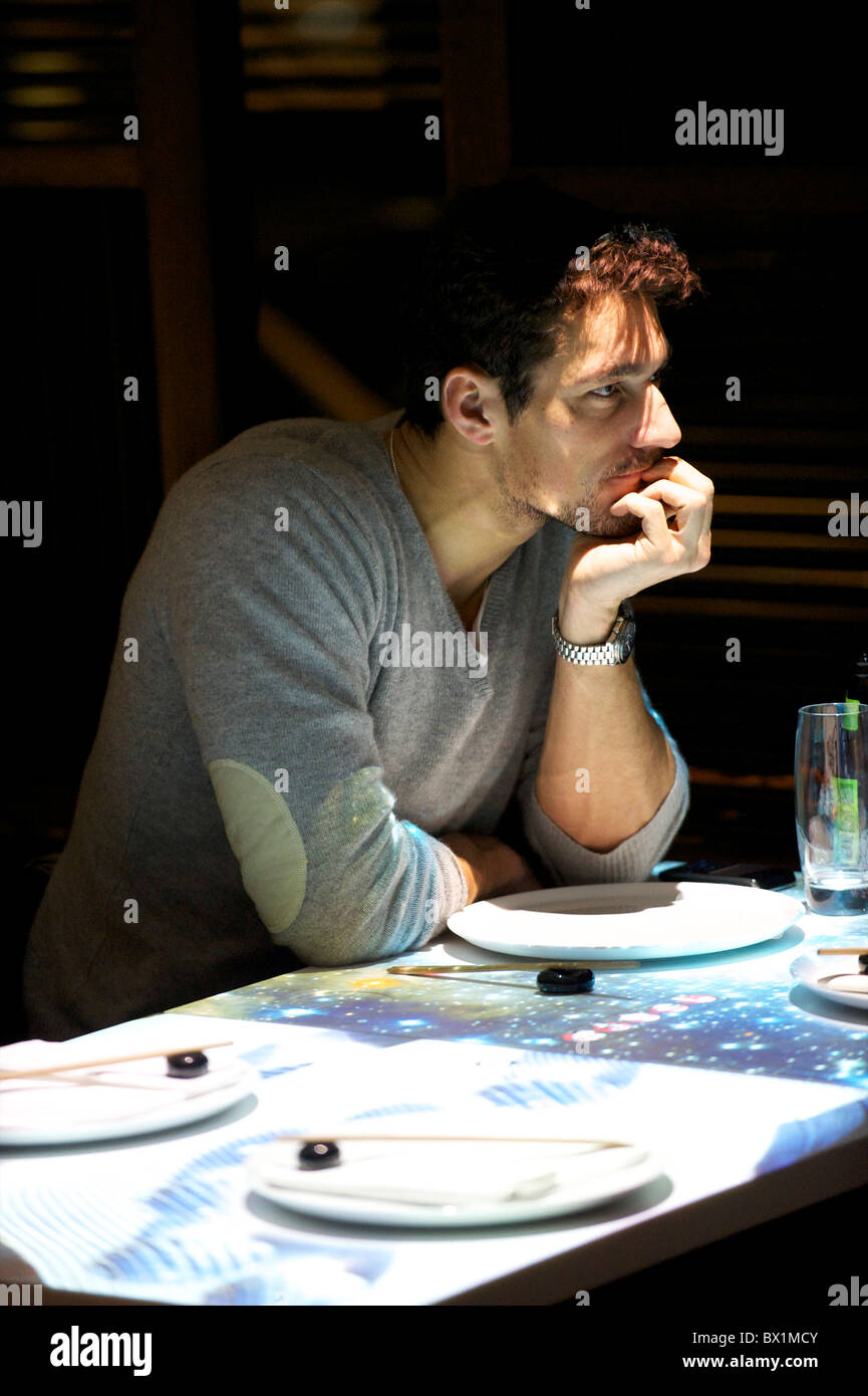 British model David Gandy attend the restaurant opening of Inamo St. James in London on December 2, 2010. Stock Photo