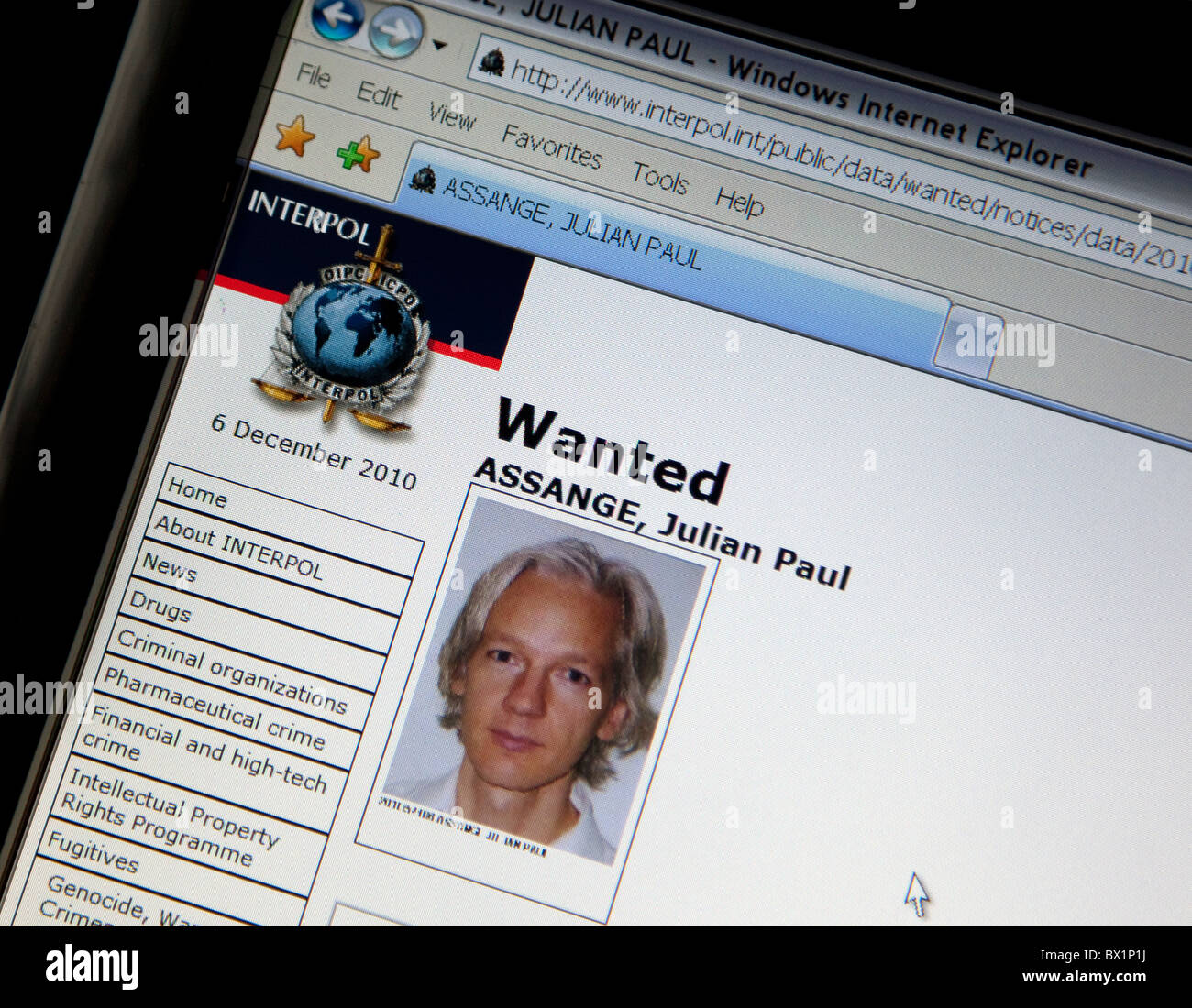 Jullian Assange of WikiLeaks 'Wanted' on Interpol website Stock Photo