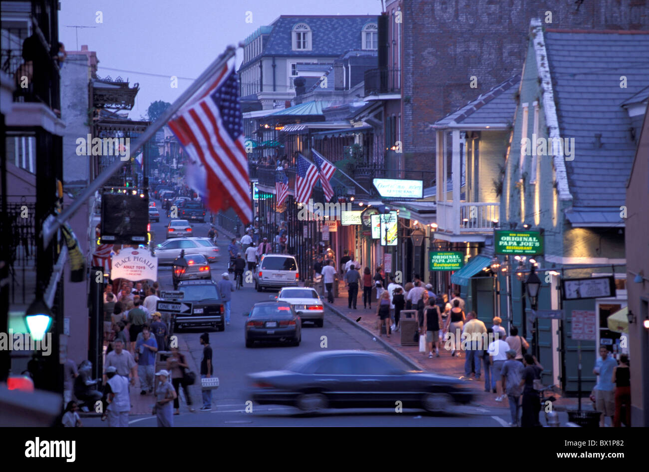 bourbon Street business dusk flags French Quarter Louisiana New Orleans