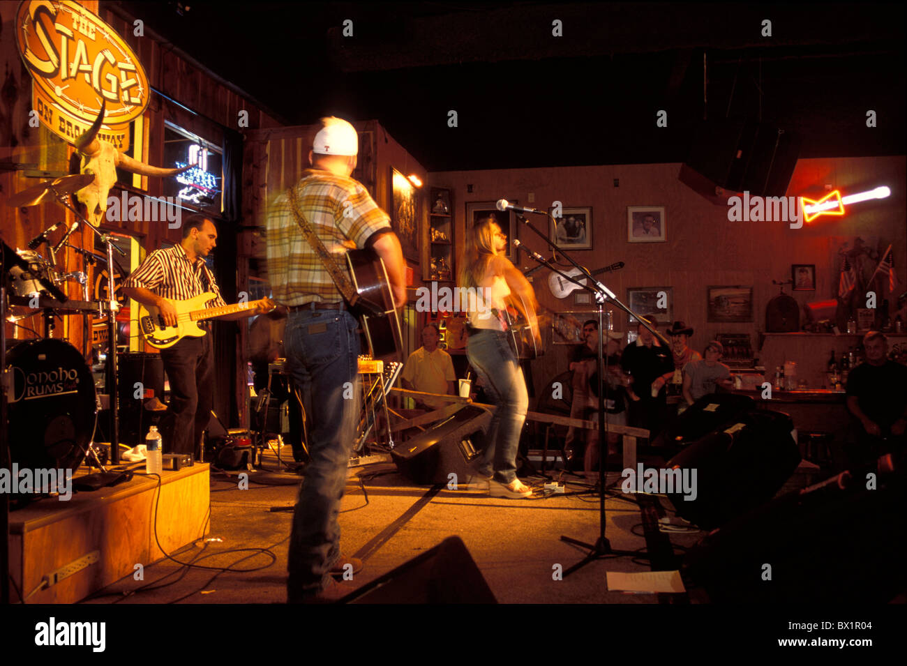 bar Broadway concert Country volume cowboy Downtown entertainment exit inside listener music Music club Stock Photo