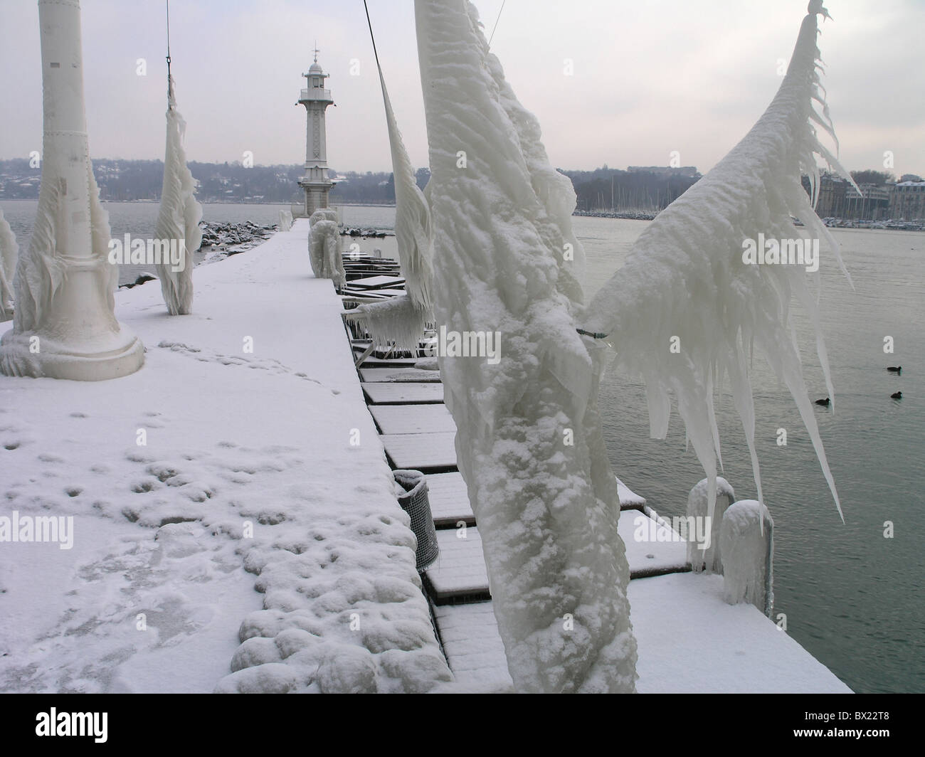city iced icy frozen ice ice storm lake lake of Geneva Geneva sculptures shore Switzerland Europe town Stock Photo