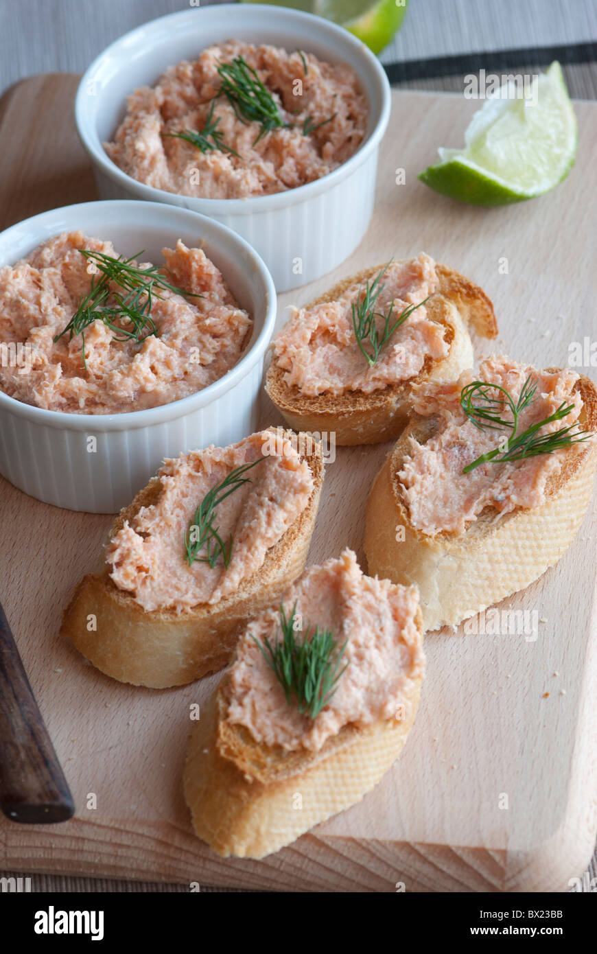 Smoked salmon pate with dill on toasted baguette Stock Photo