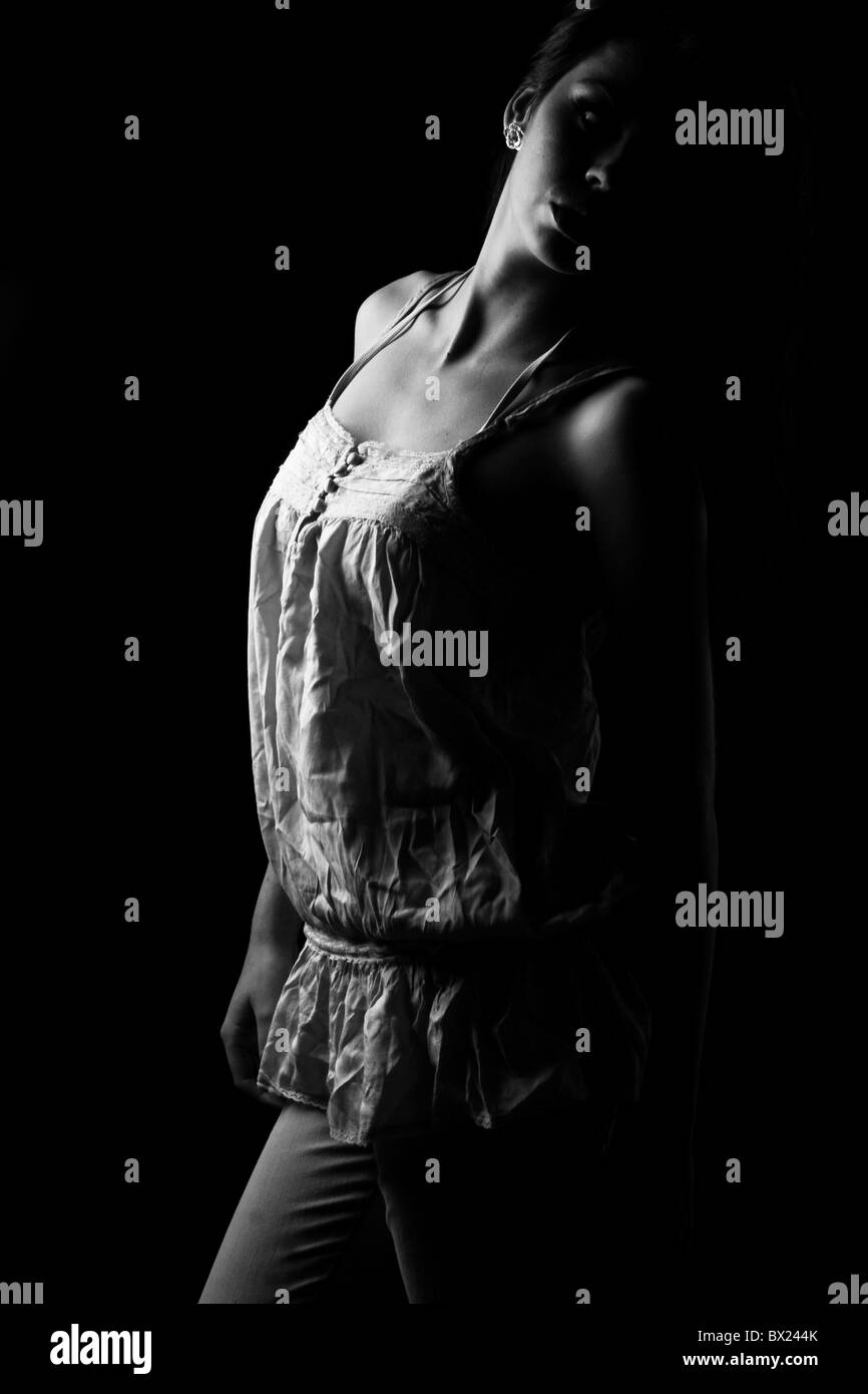 Black and white fashion portrait of a model wearing a stylish top Stock ...