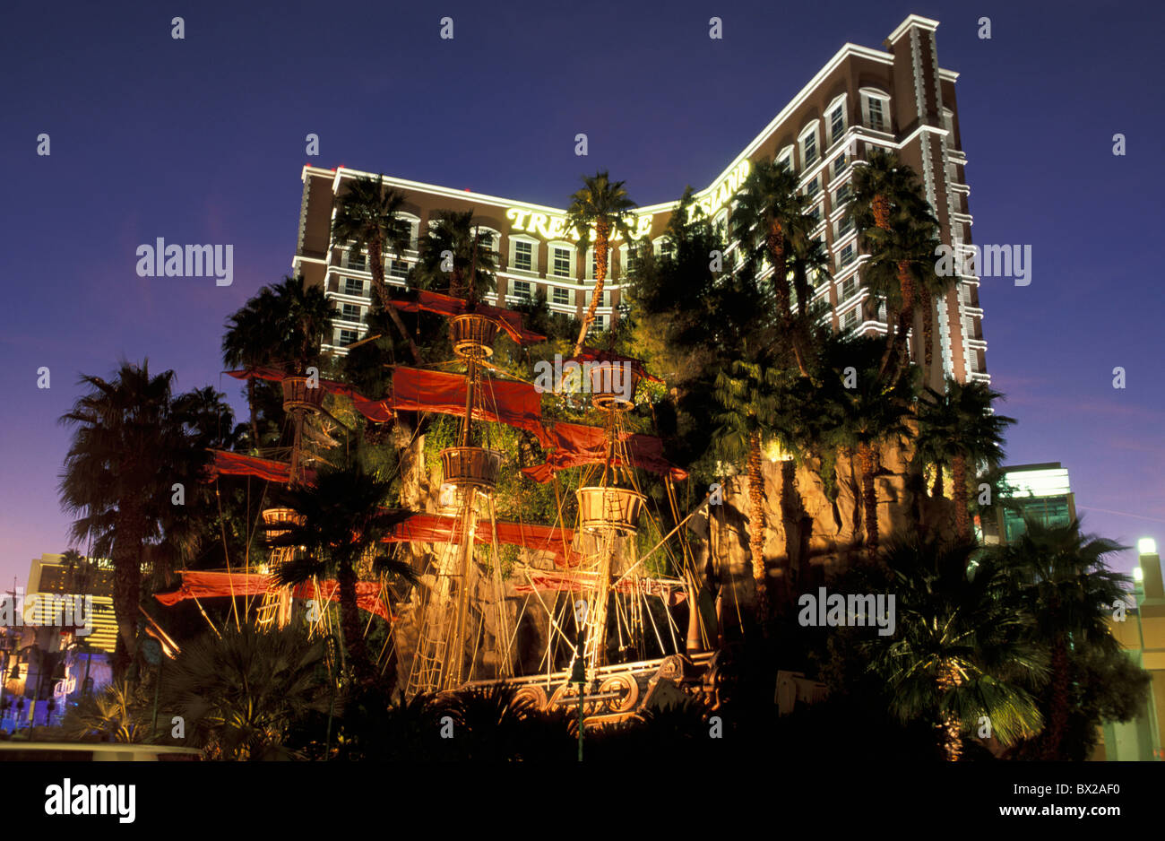 Treasure Island casino and hotel park pirate ship dusk twilight Strip Las Vegas Nevada USA United States Am Stock Photo