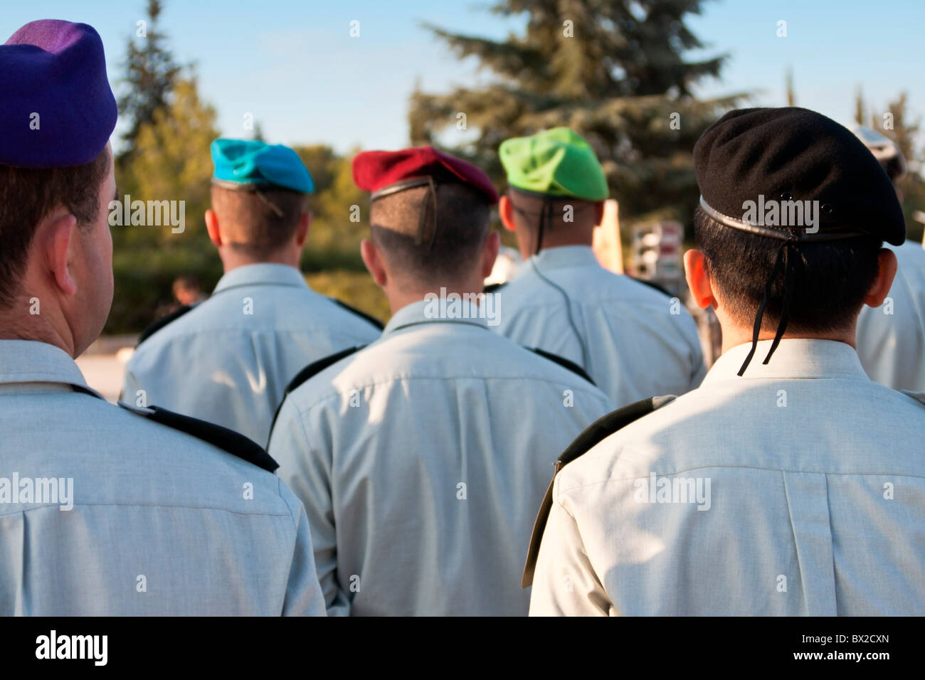 Israeli officers with different-colored berets stand at attention on parade in Jerusalem. Stock Photo