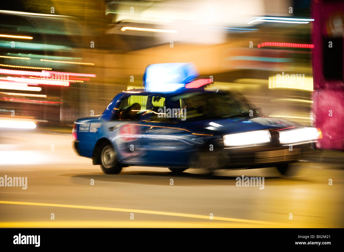 Zoomed blurred lights on city street Stock Photo