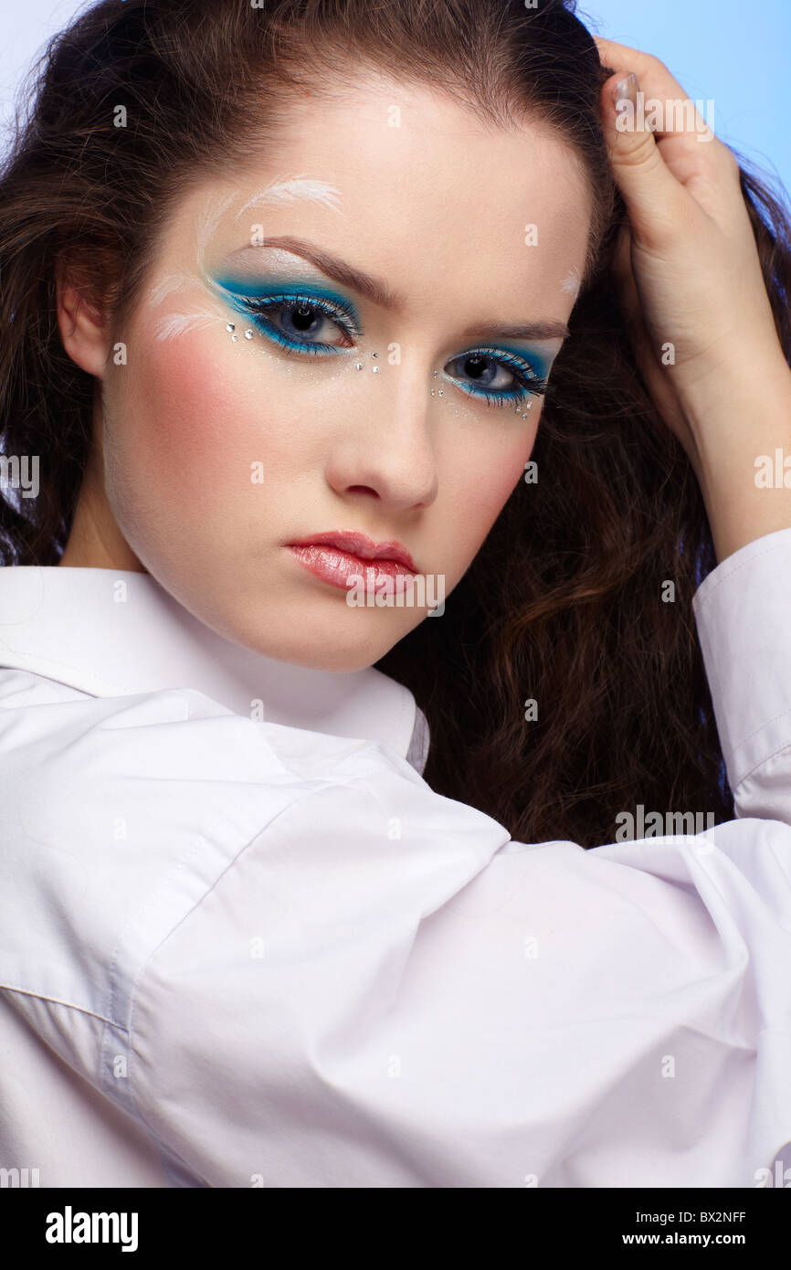 portrait of young beautiful woman in white shirt Stock Photo - Alamy