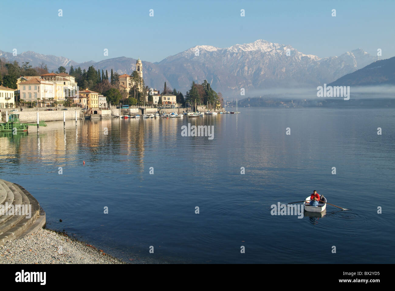 Tremezzo village Boat rowing boat lake lake shore Lago di Como Comersee Italy Europe Lombardy scenery Stock Photo
