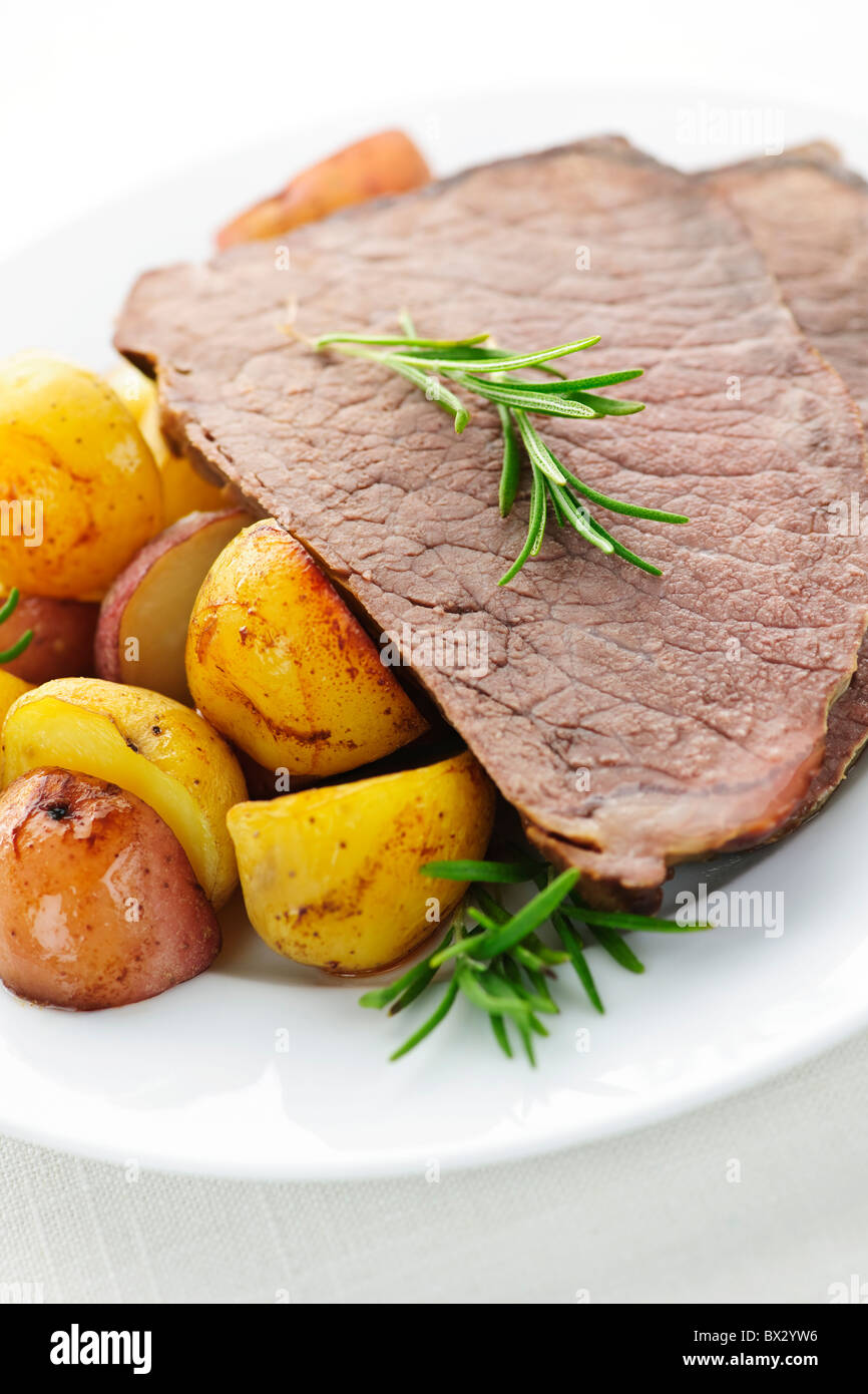 Serving of roast beef and roasted potatoes meal Stock Photo Alamy