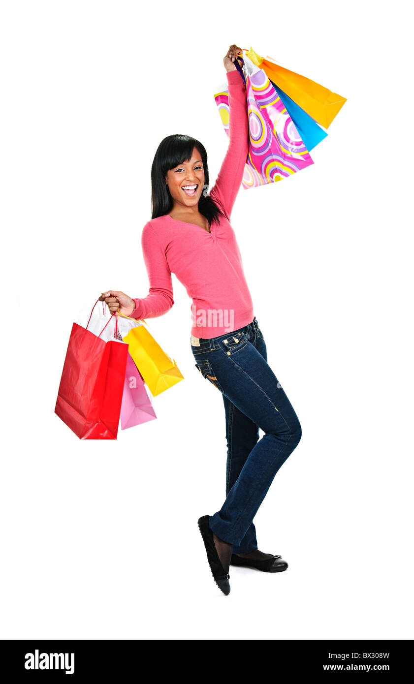 Young excited smiling black woman holding shopping bags Stock Photo - Alamy