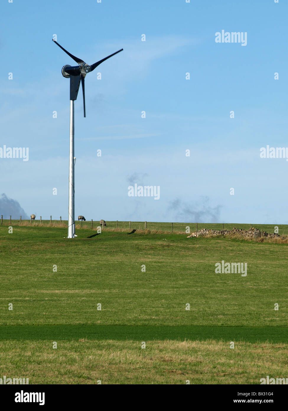 Hill farmers diversify to raise additional income from wind turbine power electricity Stock Photo