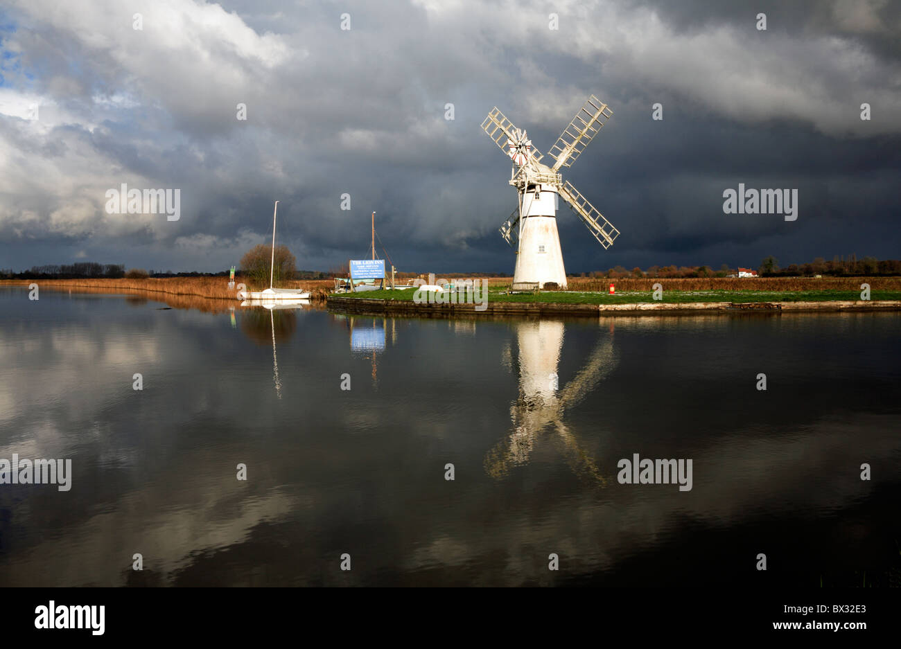 A stormy scene on the River Thurne on the Norfolk Broads at Thurne ...