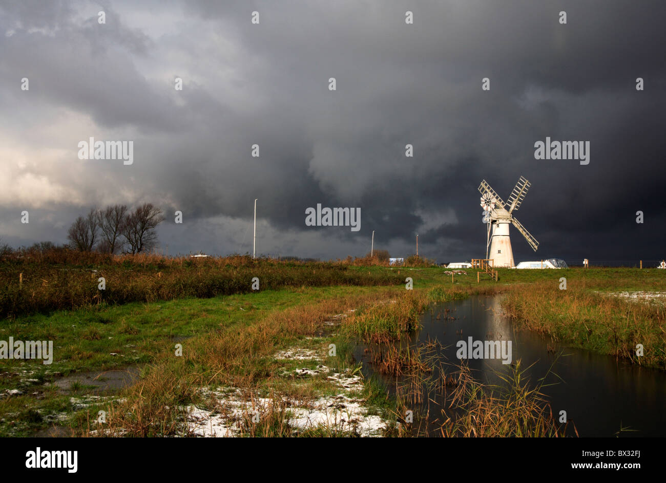A stormy scene on the Norfolk Broads at Thurne, Norfolk, England ...
