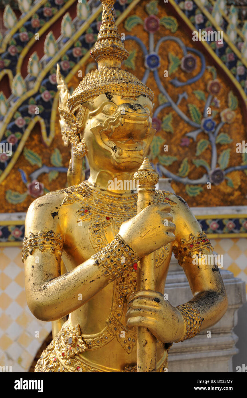 Golde Temple Guardian at Wat Phra Kaeo in Bangkok Stock Photo
