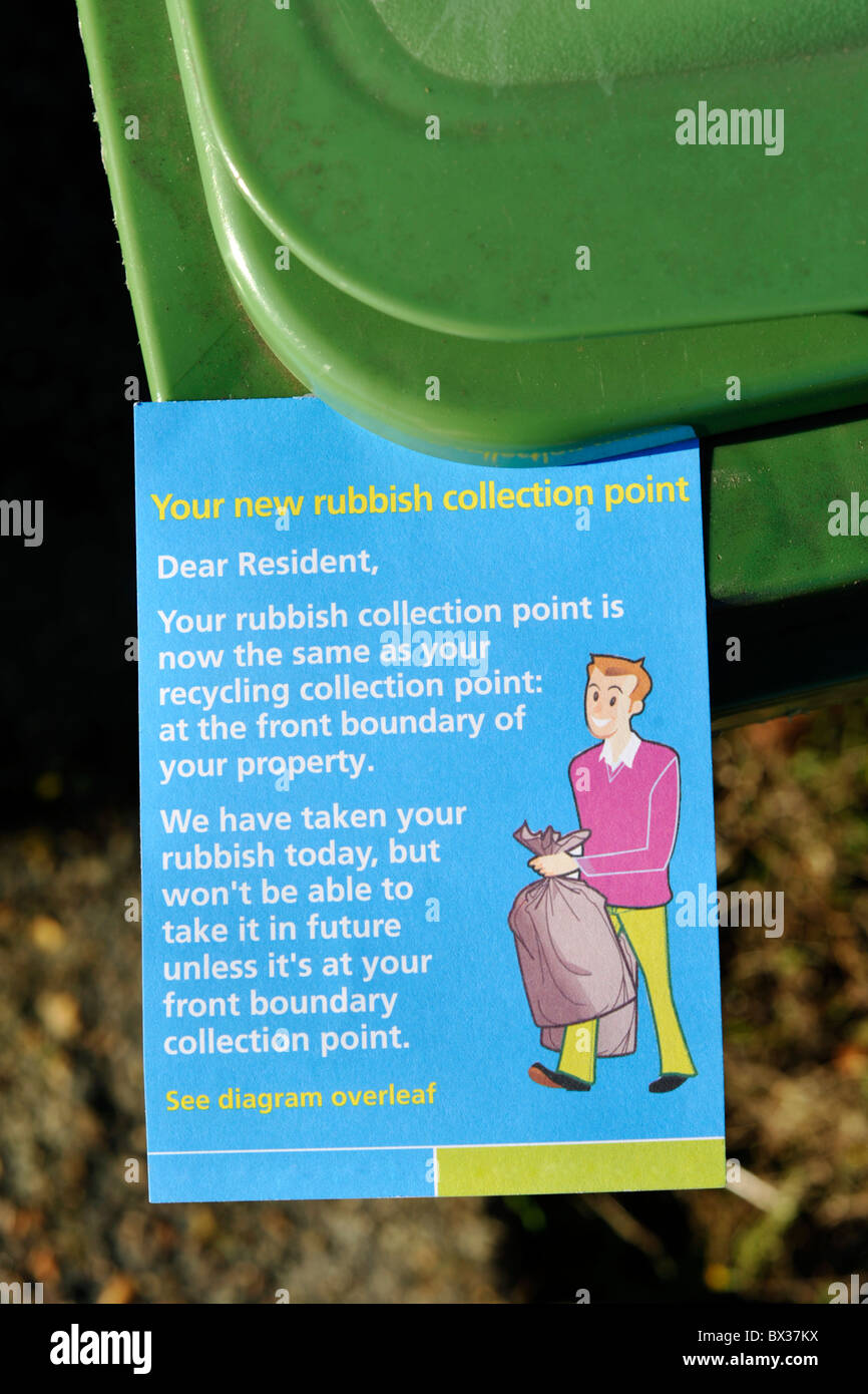 information leaflet attached to a recycling bin Stock Photo